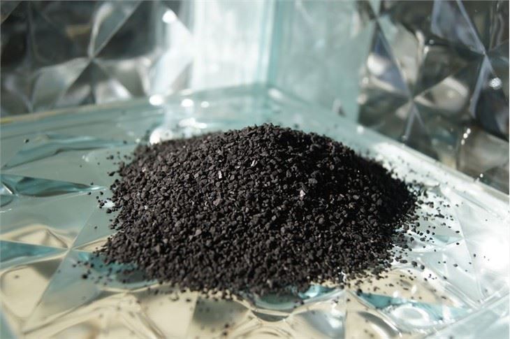 Impregnated activated carbon